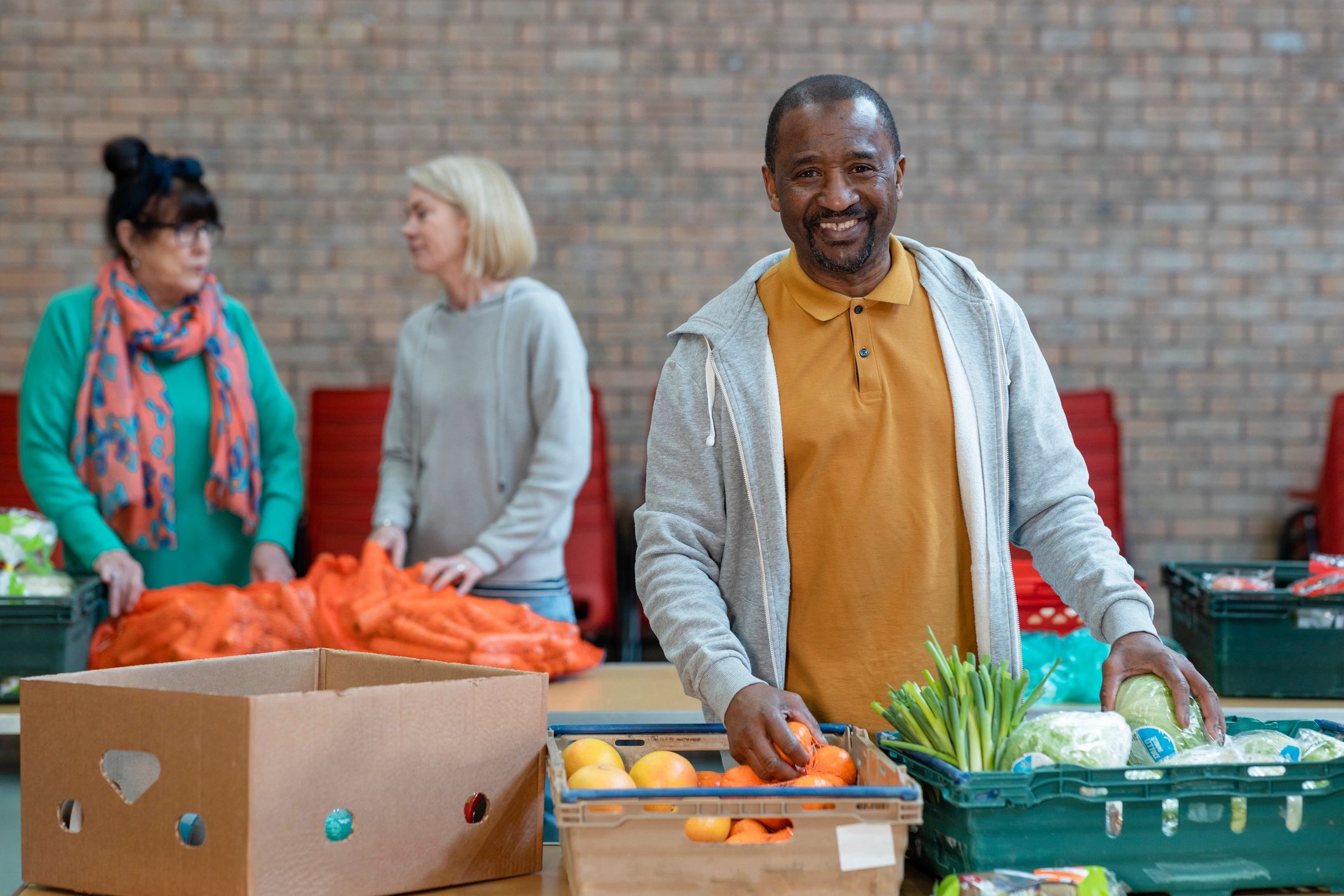 Volunteer supporting community donation efforts